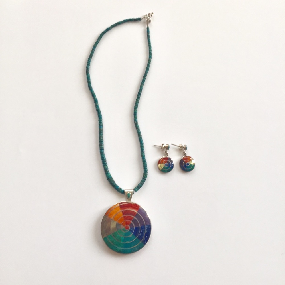 Green collar with round multicolor spiral pendant